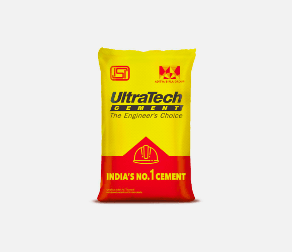 UltraTech cement bags stacked on a construction site